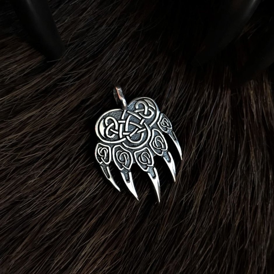 Символ Велеса медвежья лапа