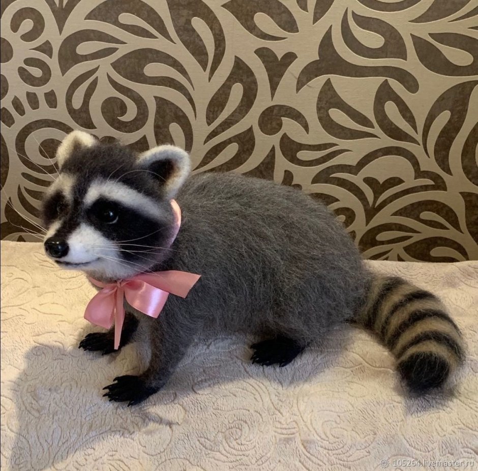 Игрушка енот