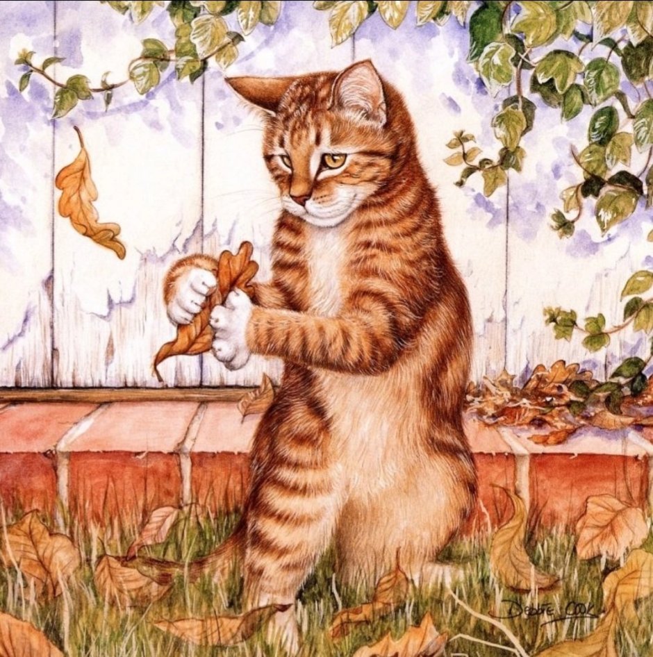 Кот с мышью в зубах