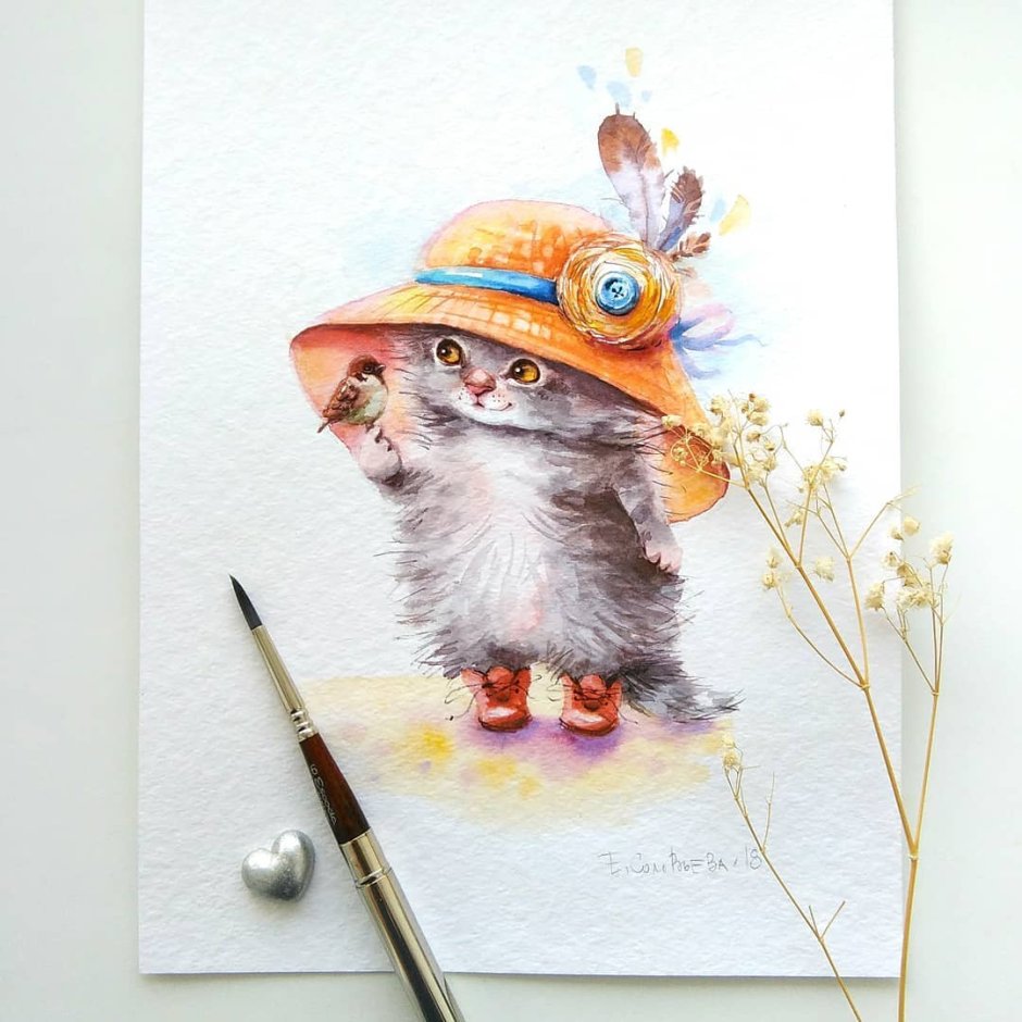 Милый котик в костюме акулы