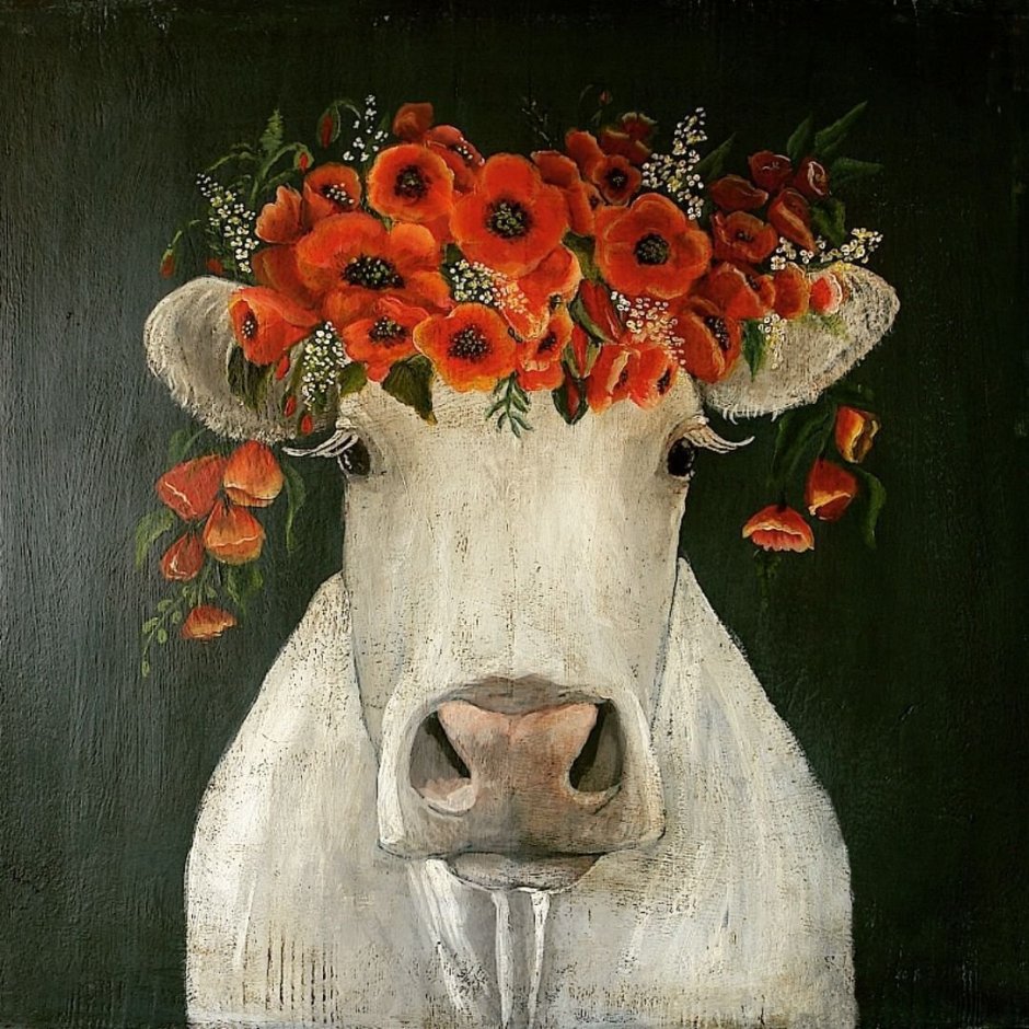 Корова с венком на голове